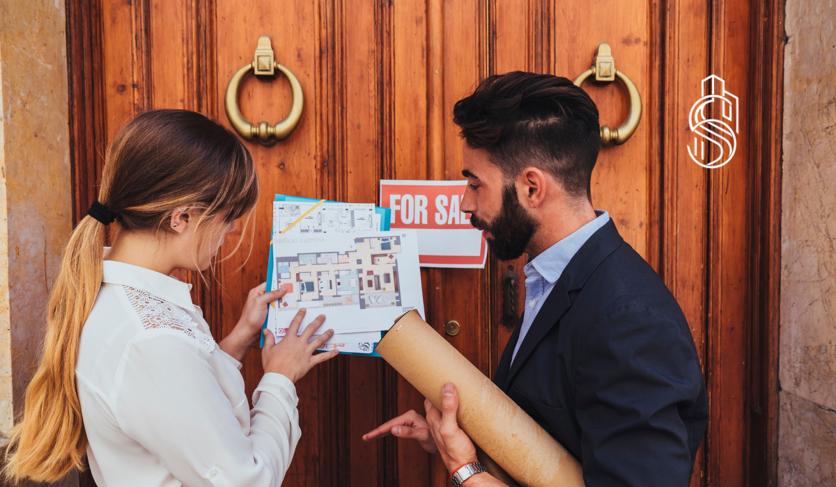 talking with real estate agent